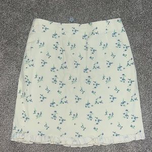 urban outfitters yellow tight mini skirt with lavender floral print.